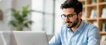 An individual learning and working on a laptop