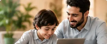 A father supporting his child as they learn together